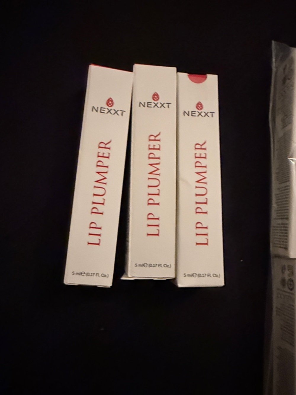 Nexxt Lip Plumper - White & Red Retail Boxes-1 left